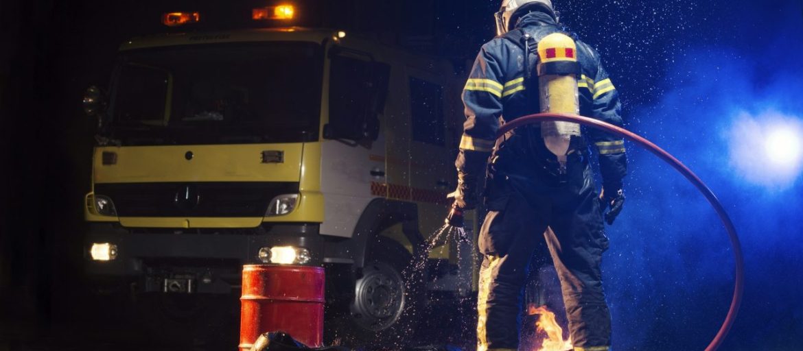 muscular-firefighter-on-mission